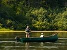 Fishing in a boat on the Moisie River